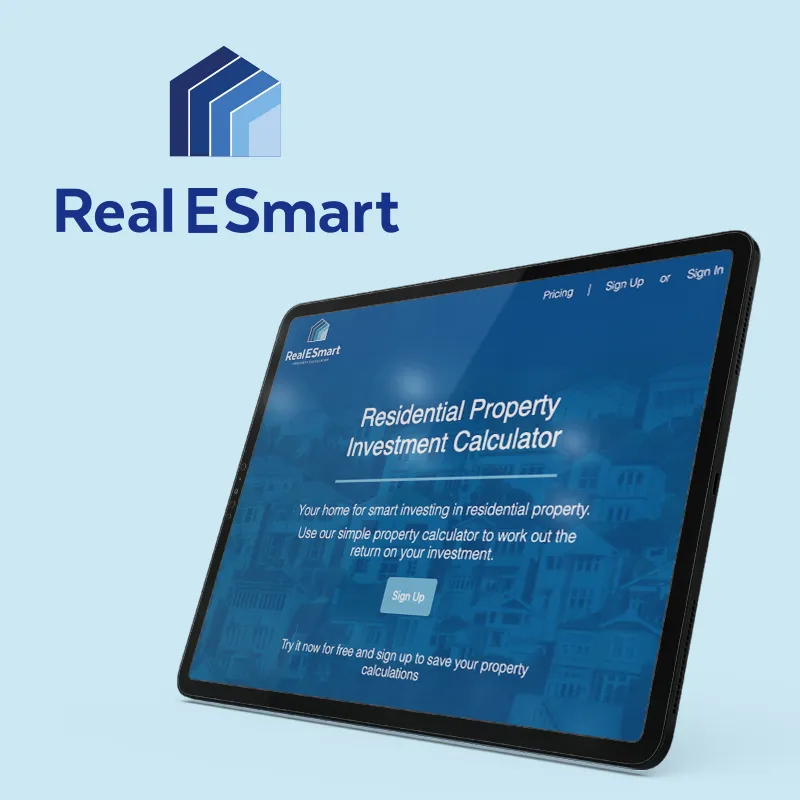 The Real E Smart logo on the upper left and a tablet with the web site solution on the right.